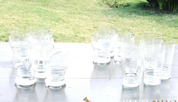 14 Copas y vasos en cristal labrado y 1 Botellon con tapa