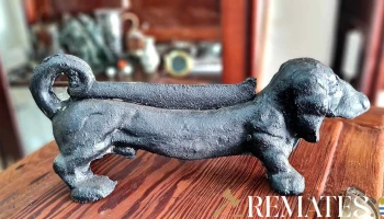 Perro limpiabotas de fundicion
