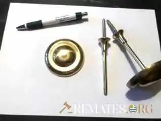 Ganchos de cortina en bronce
