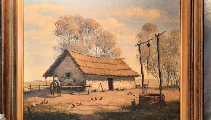 Oleo firmado Sánchez, rancho con hombre a caballo y aljibe 72 cm x 62 cm